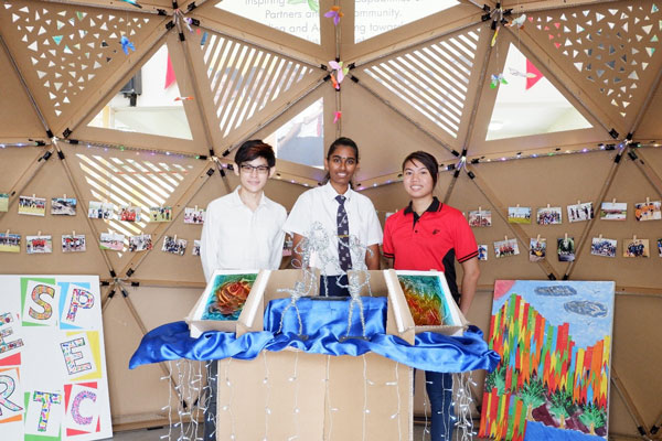 17-year-old Priyadarshani d/o Jeyabalan (centre) was among the 40 APSN DSS students who participated in the activity. The architecture and civil engineering teams were led by Ong Jian Liang (left) and Vanessa Koh (right) respectively.